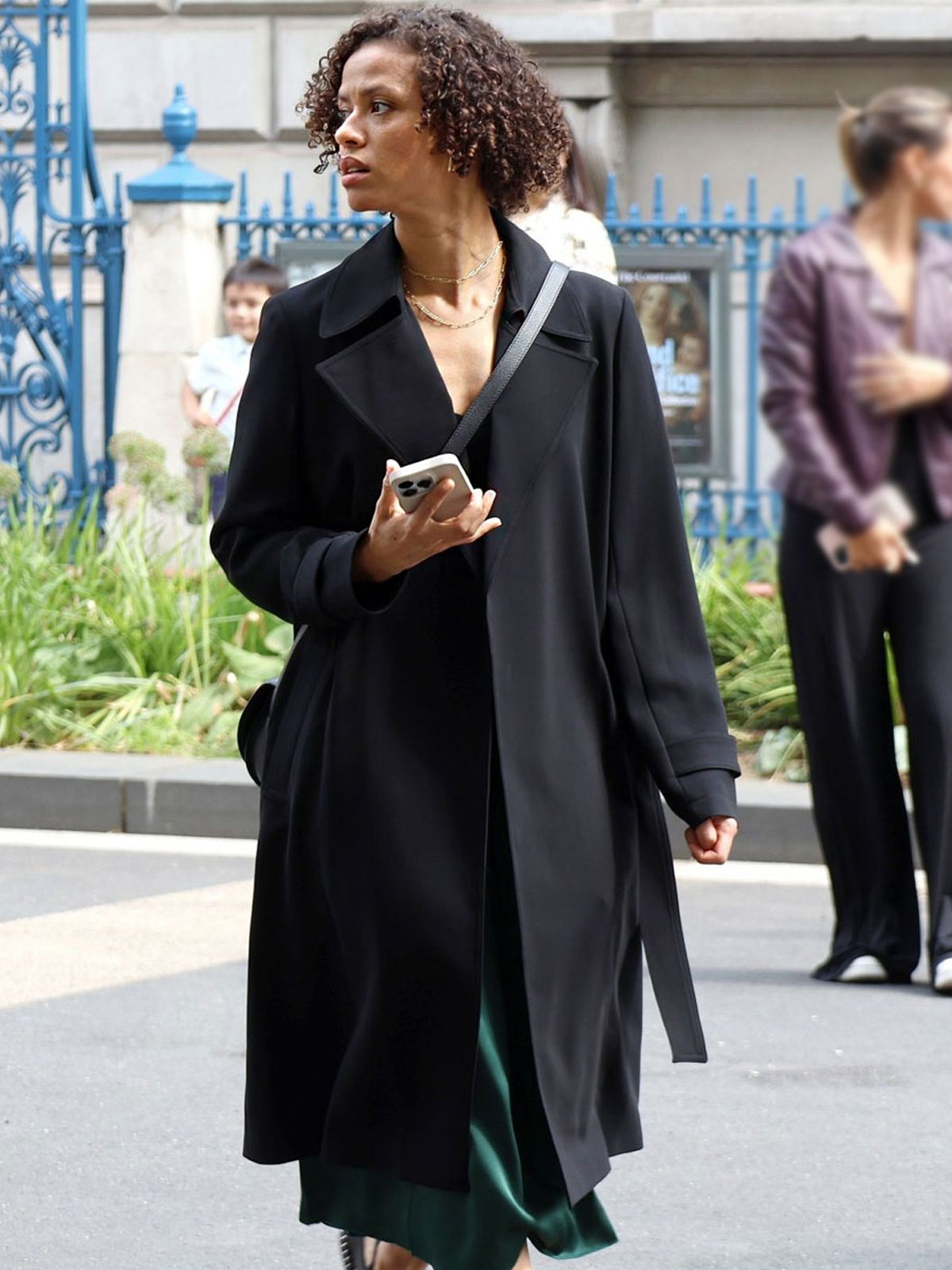 Abby Lift 2024 Gugu Mbatha-Raw long black trench coat