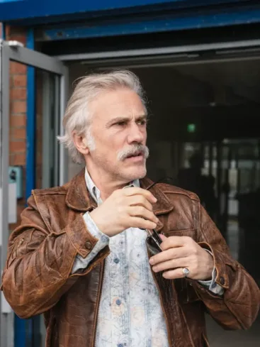 Christoph Waltz Old Guy 2025 Danny Dolinski Brown Leather Jacket